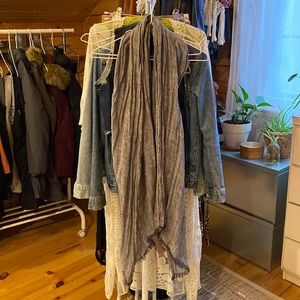 Levi’s gray scarf.